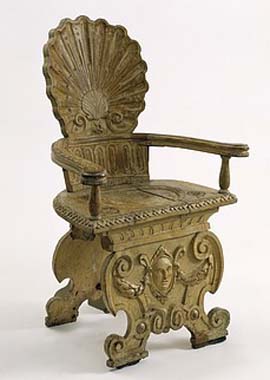 Scallop-shell back based on the sgabello, an ornate form of hall chair widely used in Venice from about 1570. 
      Materials: The arms, balusters and front slat are made of beech, the back and seat of oak.